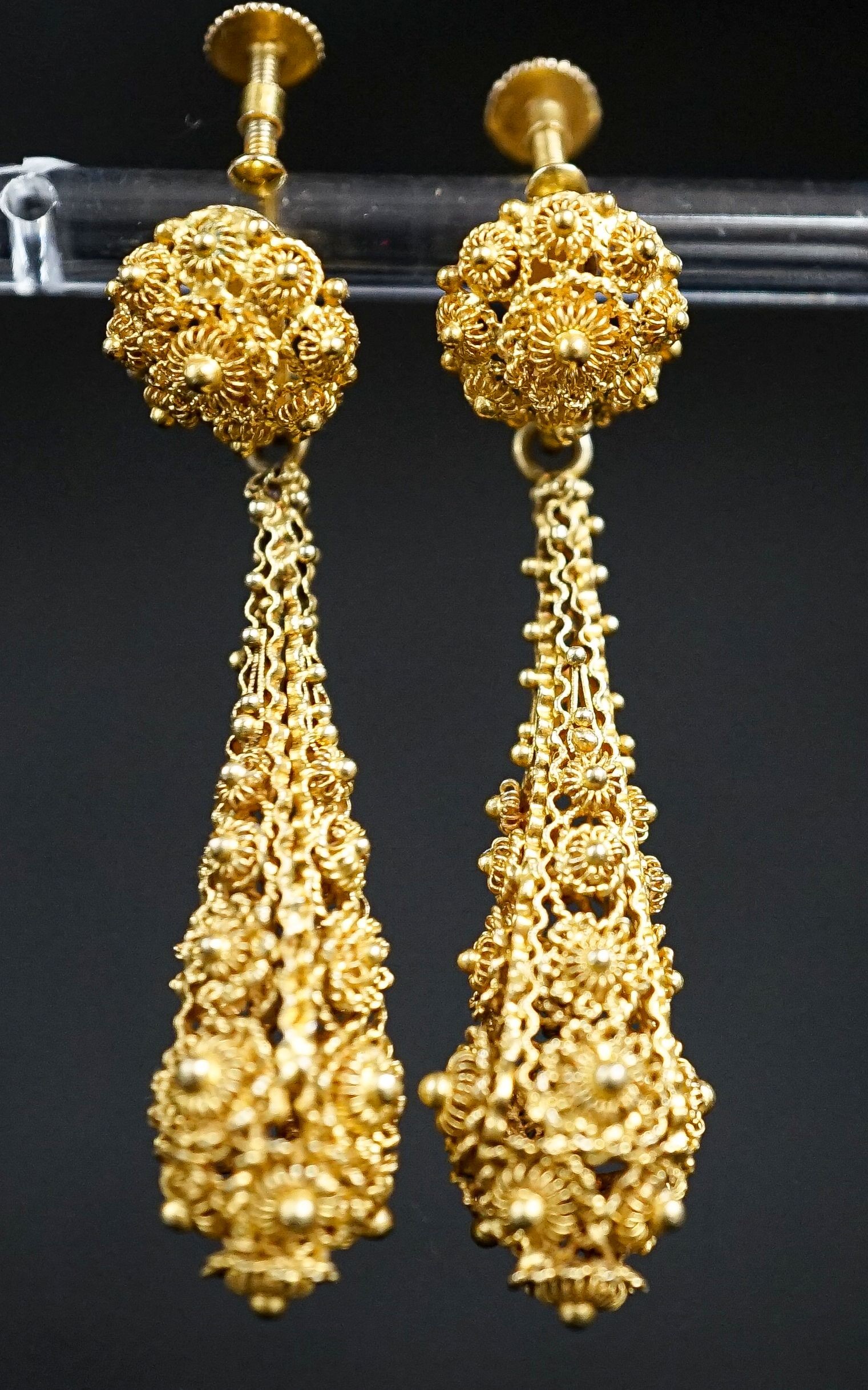 A pair of antique yellow metal filigree cannetile work teardrop shaped earrings, 45mm. 4.6cm.